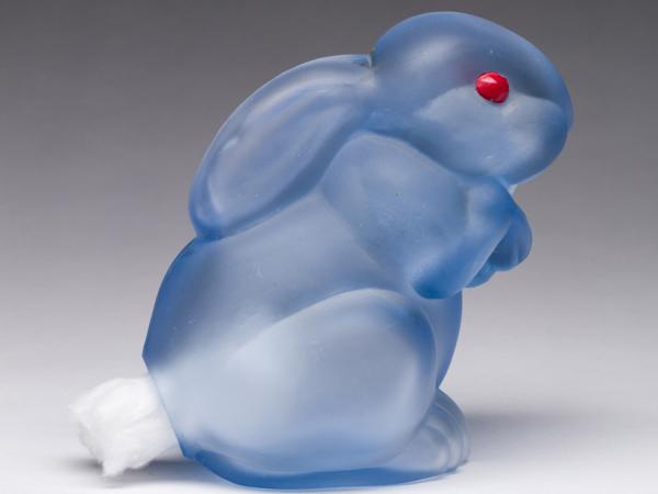 Light blue dispenser shaped like a small rabbit
