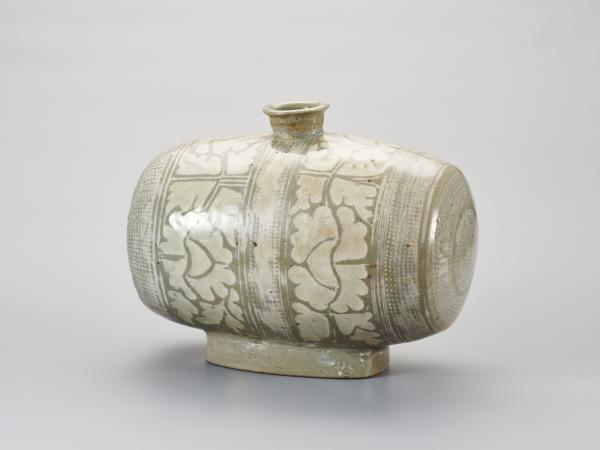 Barrel-shaped Japanese ceramic bottle