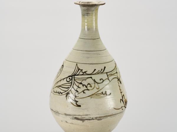 Japanese bottle with fish decorations