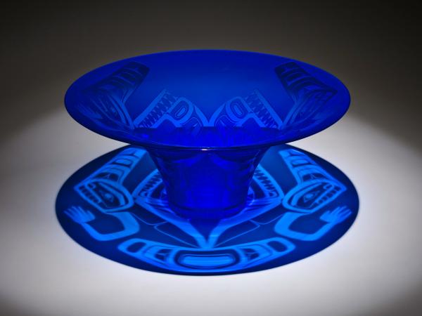 Blue carved rounded glass pot