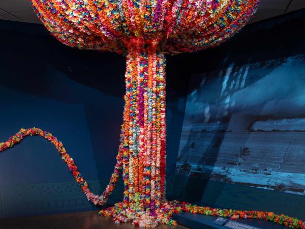 Gallery view of a colorful installation made to resemble a bomb explosion