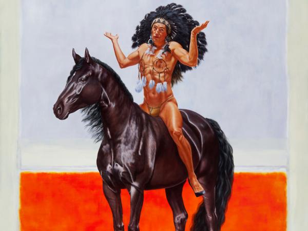 Native American man shrugging while atop a horse