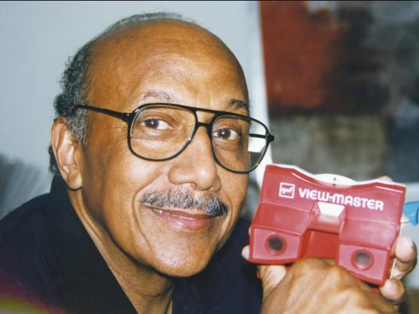 Charles Harrison holding a red View-Master