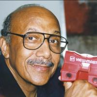Charles Harrison holding a red View-Master