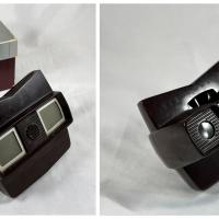 two images. on the left is a photo of the front of a black view master and its box on the right is the same view master shown from the back