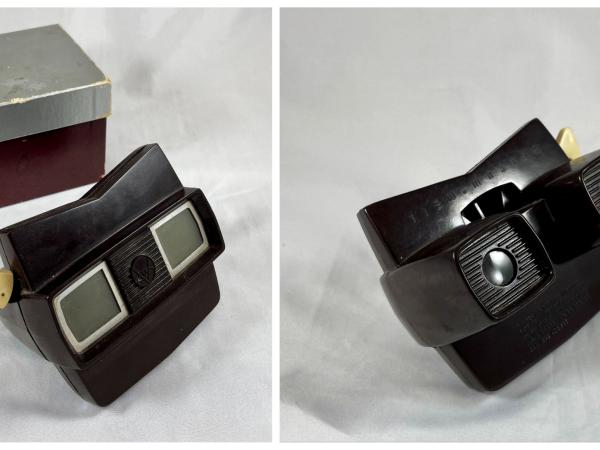 two images. on the left is a photo of the front of a black view master and its box on the right is the same view master shown from the back